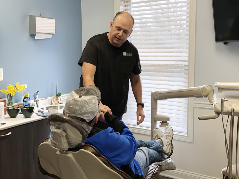 Dr. Walten with a Patient